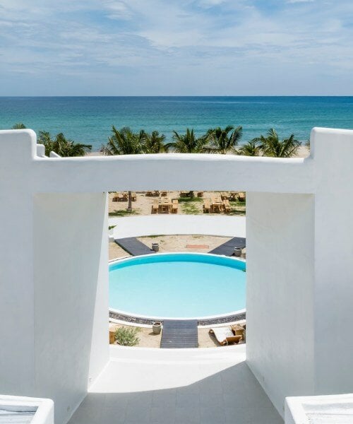 pham huu son renders mediterranean-style beach resort in vietnam in white lime