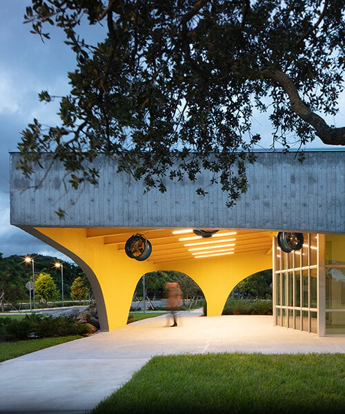 brooks + scarpa sculpts florida pavilion with yellow archways and lattice screen